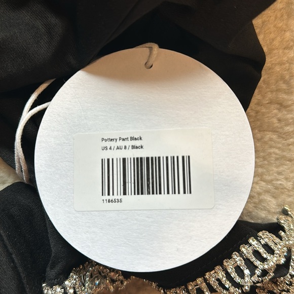 Princess Polly, Size 4. Black with Rhinestones on Arm Cuffs and Pant Legs. NWT - Picture 5 of 7